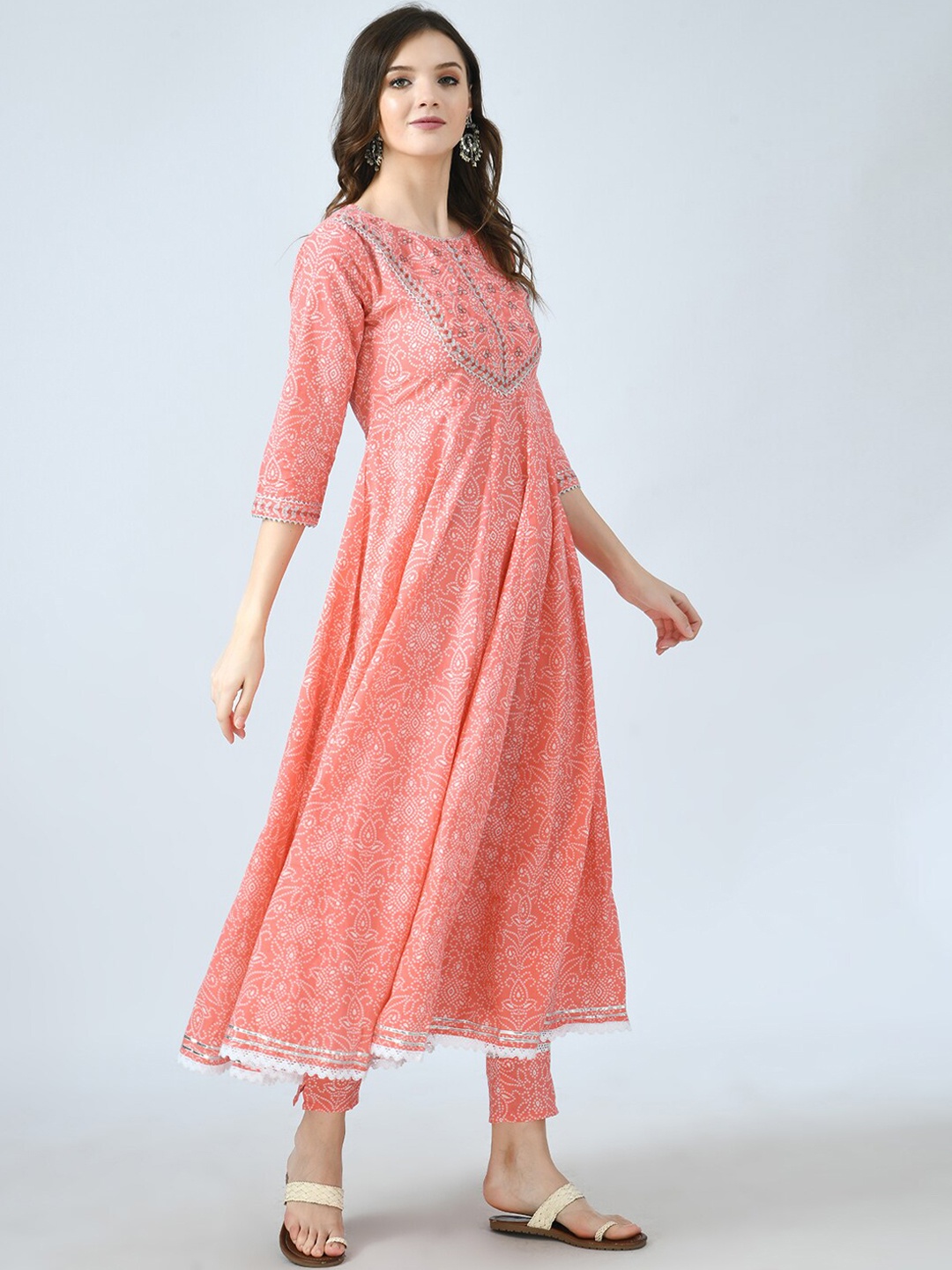KALINI Women Peach-Coloured Bandhani Printed High Slit Kurti with Trousers
KALINI Women Peach-Coloured Bandhani Printed High Slit Kurti with Trousers