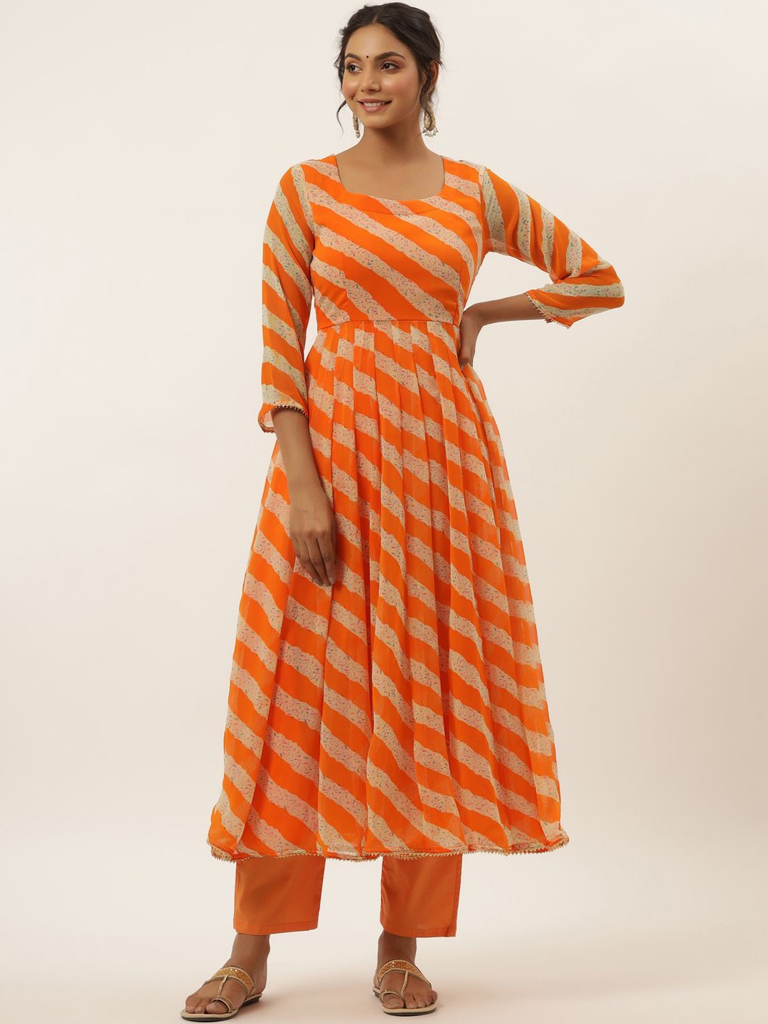 HOUSE OF JAMOTI Women Orange Ethnic Motifs Printed Angrakha Kurti with Trousers & With Dupatta
HOUSE OF JAMOTI Women Orange Ethnic Motifs Printed Angrakha Kurti with Trousers & With Dupatta