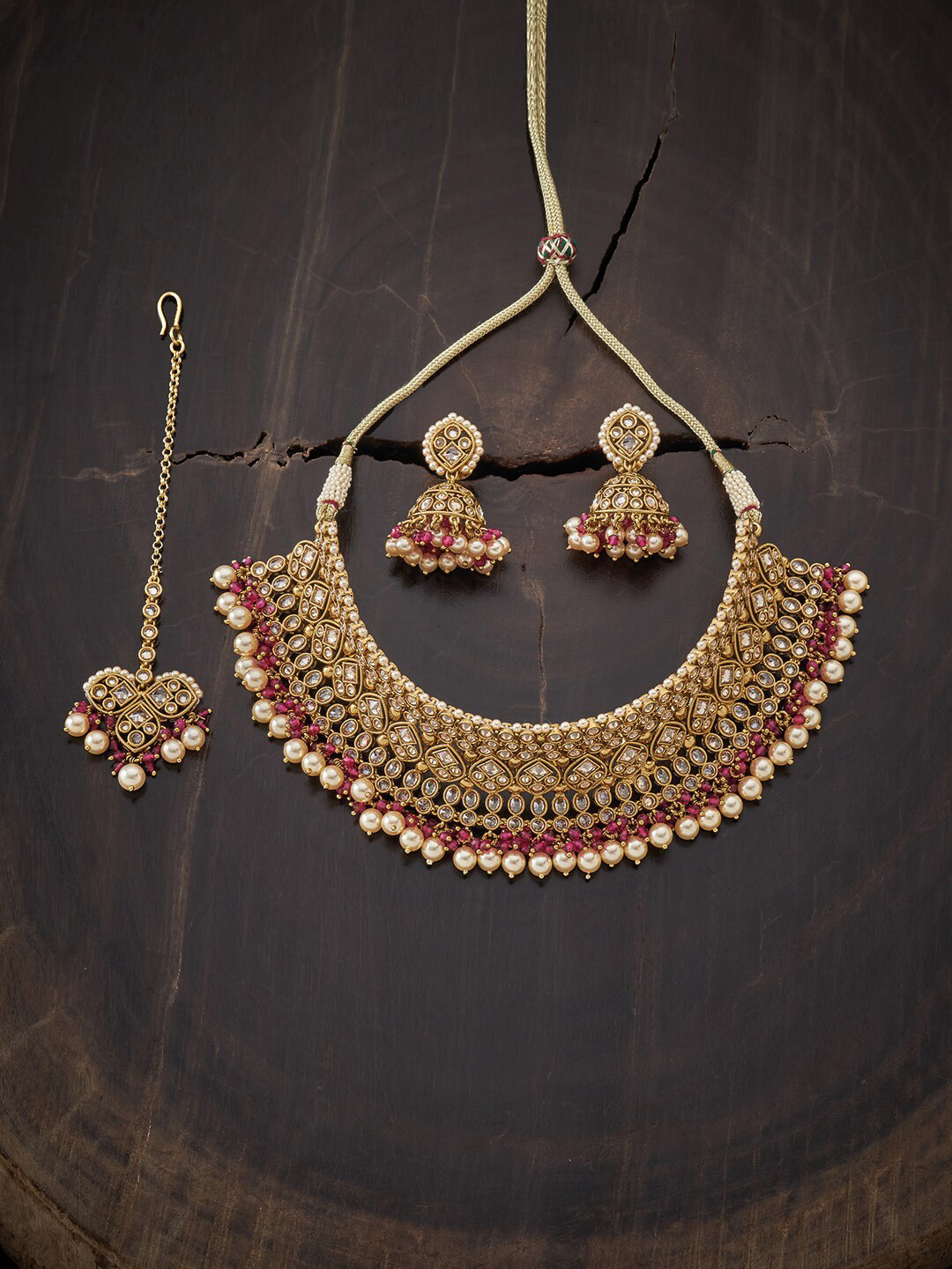 Kushal's Fashion Jewellery Gold-Plated White & Red Stone-Studded & Pearl Beaded Vilandi Jewellery Set
Kushal's Fashion Jewellery Gold-Plated White & Red Stone-Studded & Pearl Beaded Vilandi Jewellery Set
