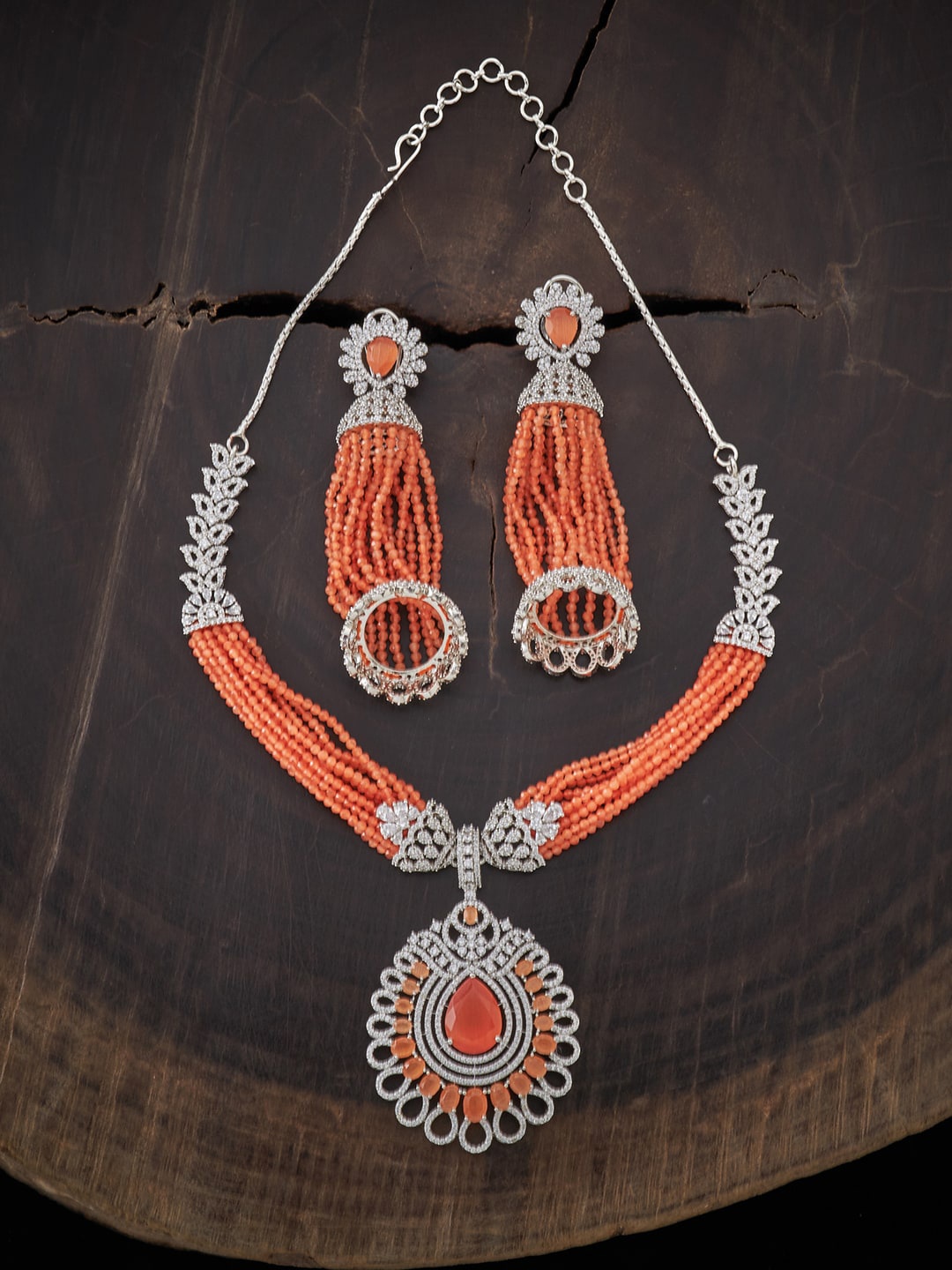Kushal's Fashion Jewellery Rhodium-Plated Orange & White CZ Studded & Beaded Jewellery Set
Kushal's Fashion Jewellery Rhodium-Plated Orange & White CZ Studded & Beaded Jewellery Set