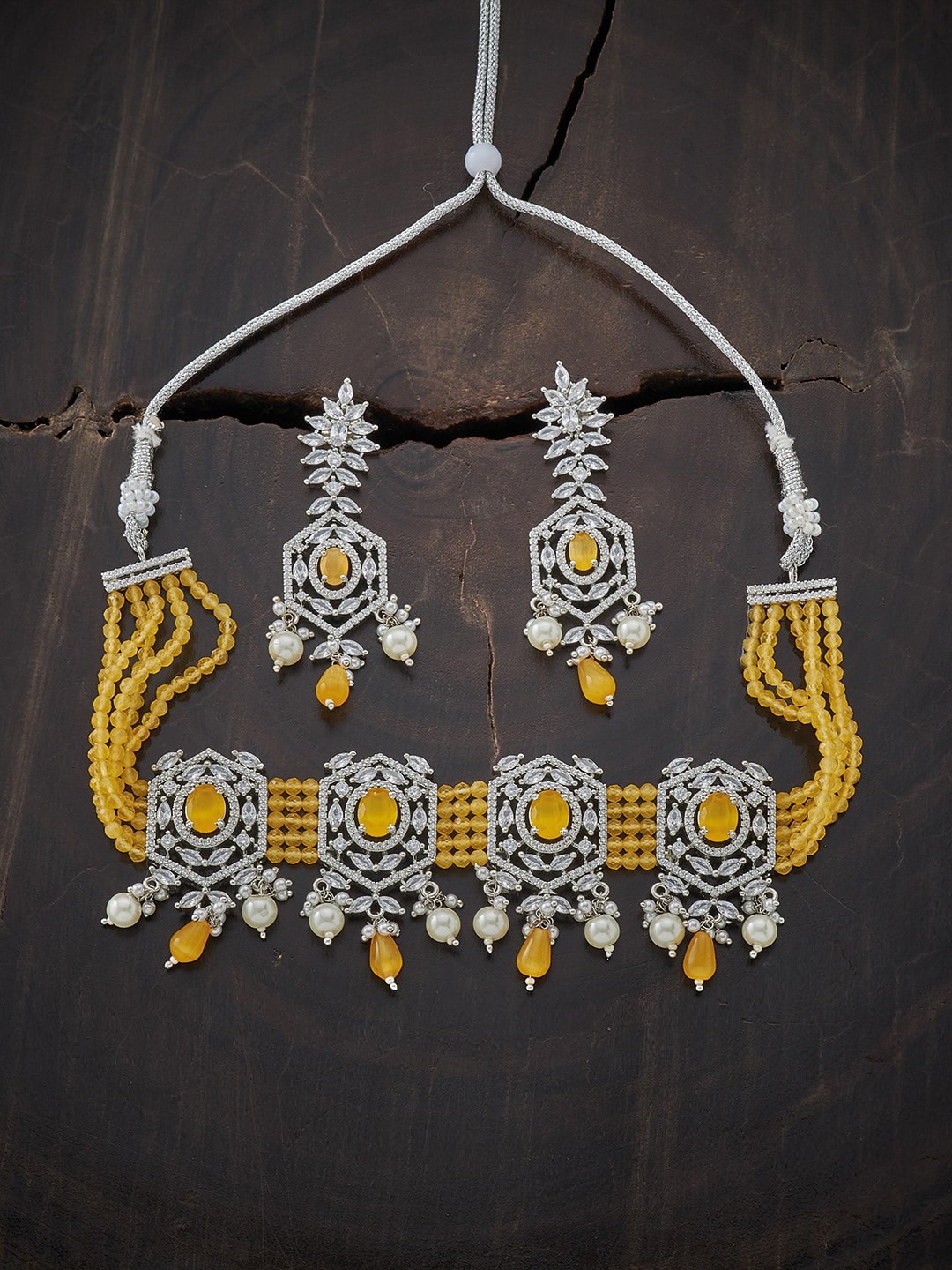 Kushal's Fashion JewelleryRhodium-Plated Yellow CZ-Studded & Beaded Choker Jewellery Set
Kushal's Fashion JewelleryRhodium-Plated Yellow CZ-Studded & Beaded Choker Jewellery Set