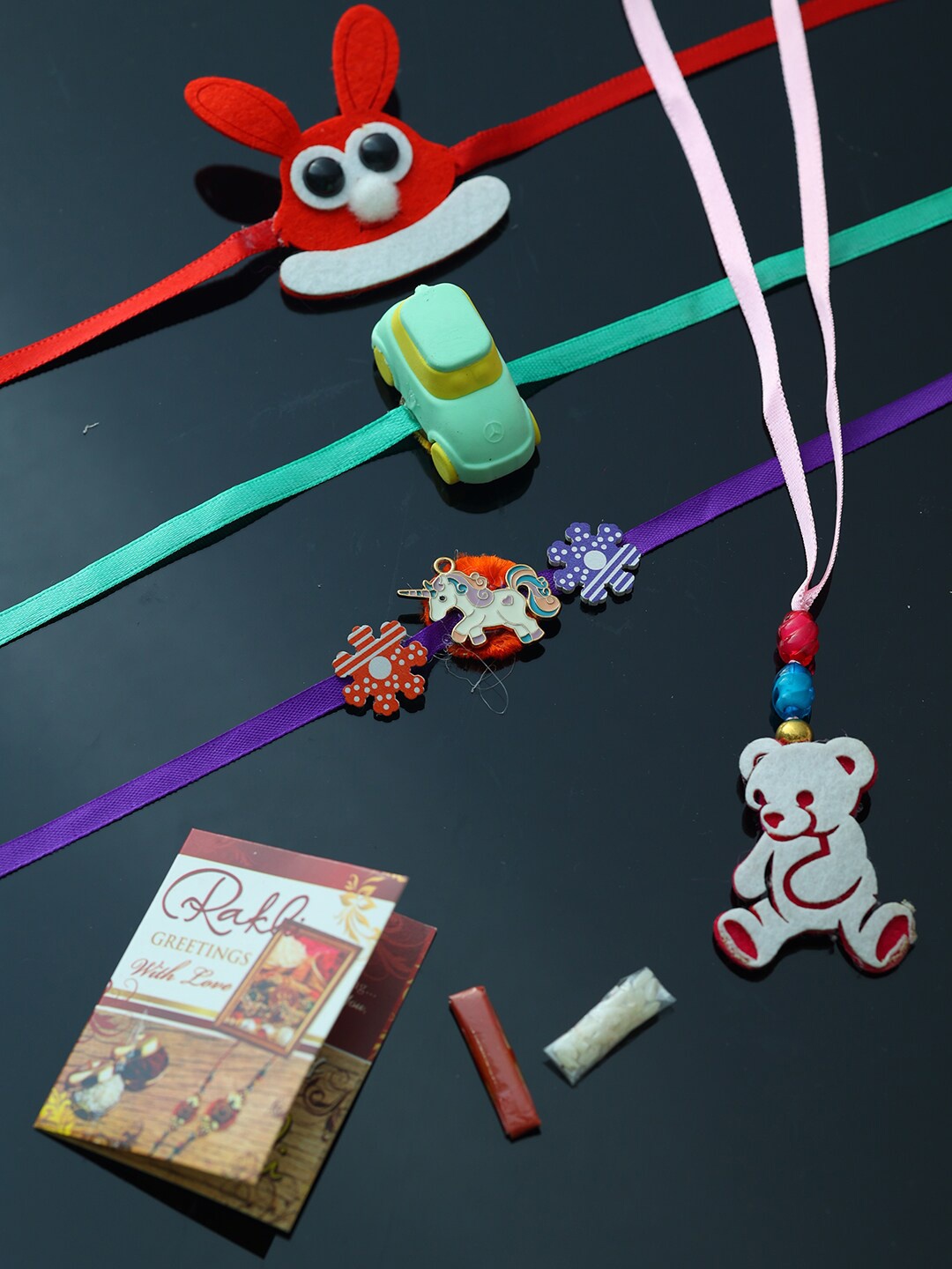 PASSION PETALS Red Rakhi Set