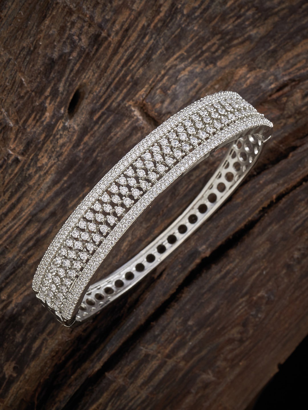 Kushal's Fashion Jewellery Women Silver-Toned & White Cubic Zirconia Rhodium-Plated Kada Bracelet
Kushal's Fashion Jewellery Women Silver-Toned & White Cubic Zirconia Rhodium-Plated Kada Bracelet