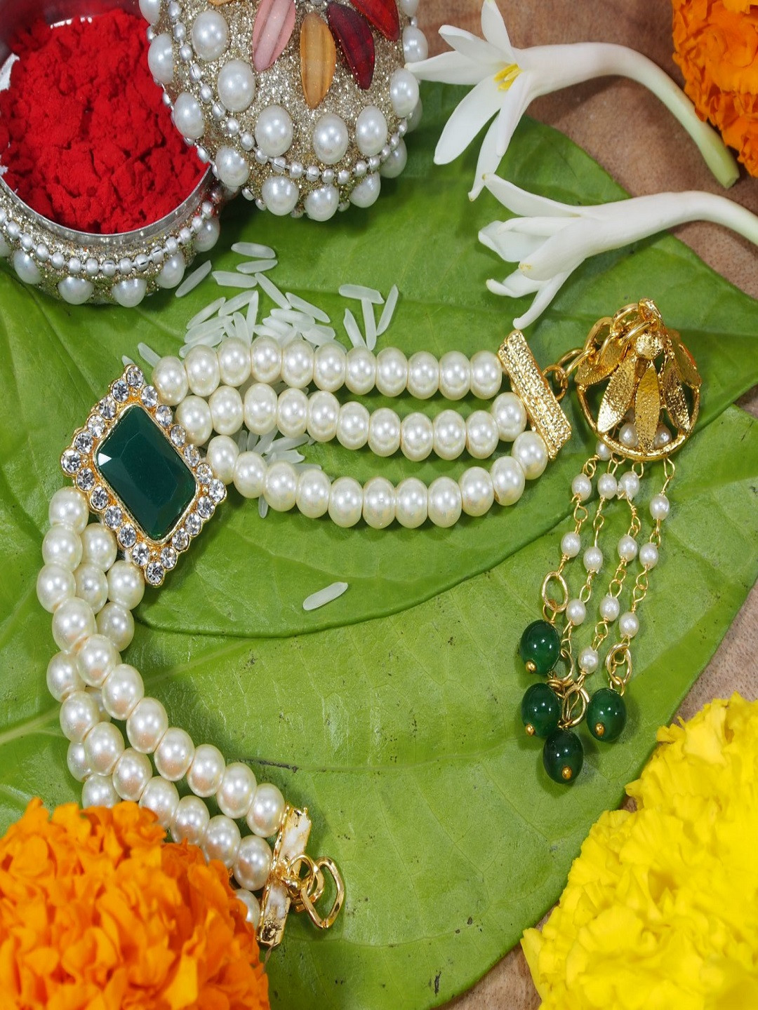 I Jewels Women Green & Off-White Pearl Beads Studded Lumba Rakhi 
I Jewels Women Green & Off-White Pearl Beads Studded Lumba Rakhi