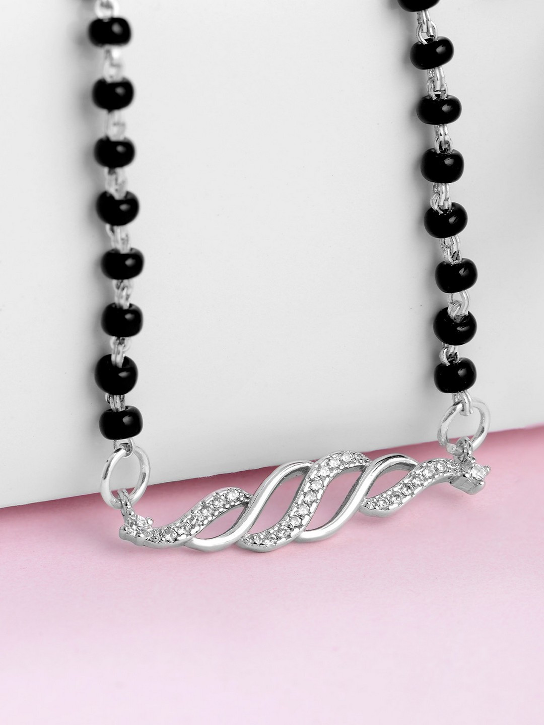 Zavya Women 925 Sterling Silver & Black Stone Studded & Beaded Rhodium Plated Mangalsutra
Zavya Women 925 Sterling Silver & Black Stone Studded & Beaded Rhodium Plated Mangalsutra