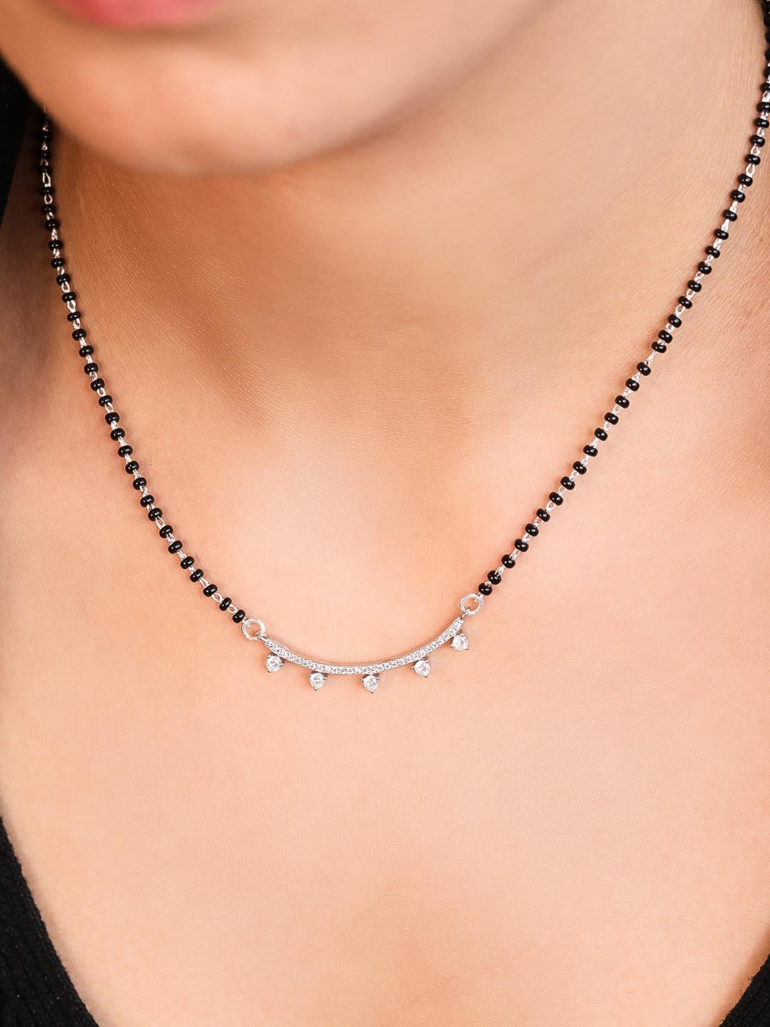 Zavya Women 925 Sterling Silver & Black Stone Studded & Beaded Rhodium Plated Mangalsutra
Zavya Women 925 Sterling Silver & Black Stone Studded & Beaded Rhodium Plated Mangalsutra