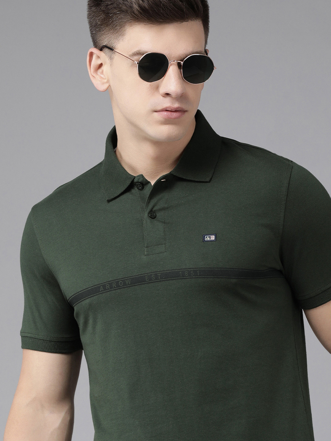 Arrow Men Olive Green Solid Pure Cotton Polo Collar T-shirt 
Arrow Men Olive Green Solid Pure Cotton Polo Collar T-shirt