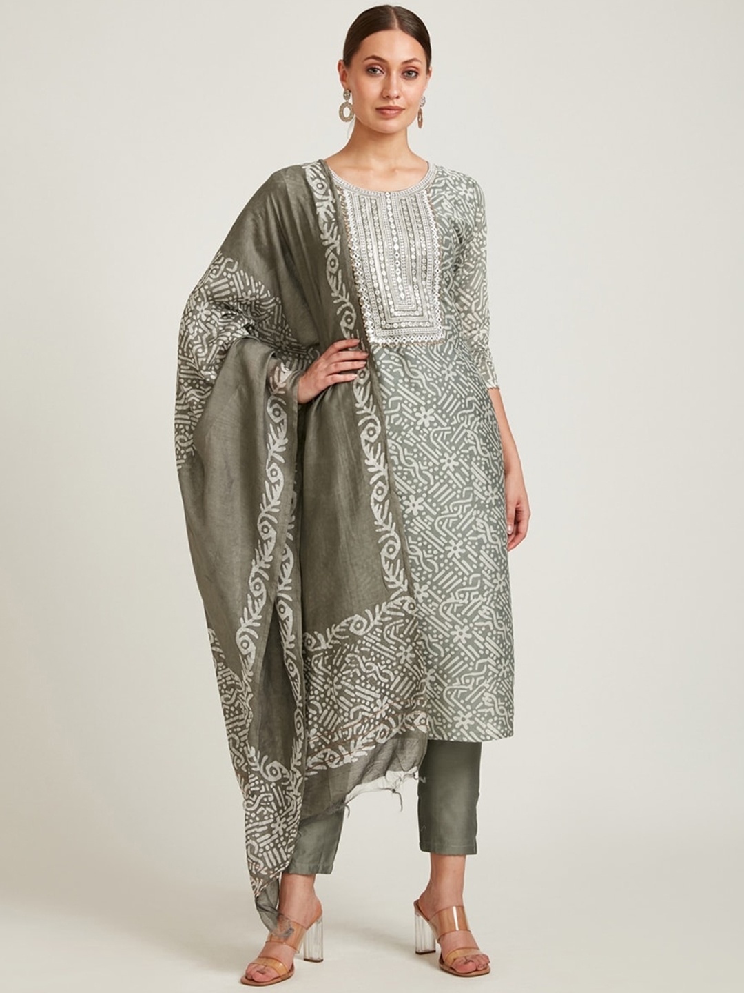 Neerus Women Grey Printed Mirror Work Pure Cotton Kurti with Trousers & With Dupatta
Neerus Women Grey Printed Mirror Work Pure Cotton Kurti with Trousers & With Dupatta
