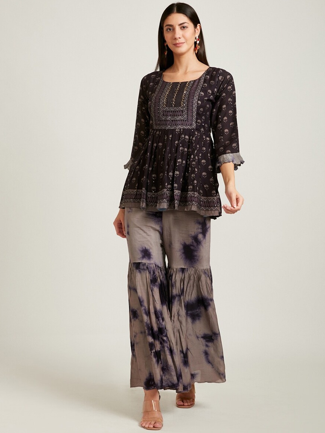 Neerus Women Black Ethnic Motifs Printed Pleated Mirror Work Kurti with Sharara & With Dupatta
Neerus Women Black Ethnic Motifs Printed Pleated Mirror Work Kurti with Sharara & With Dupatta