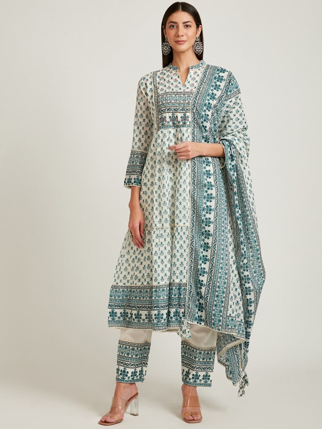 Neerus Women Turquoise Blue Printed Mirror Work Pure Cotton Kurti with Pant & Dupatta
Neerus Women Turquoise Blue Printed Mirror Work Pure Cotton Kurti with Pant & Dupatta