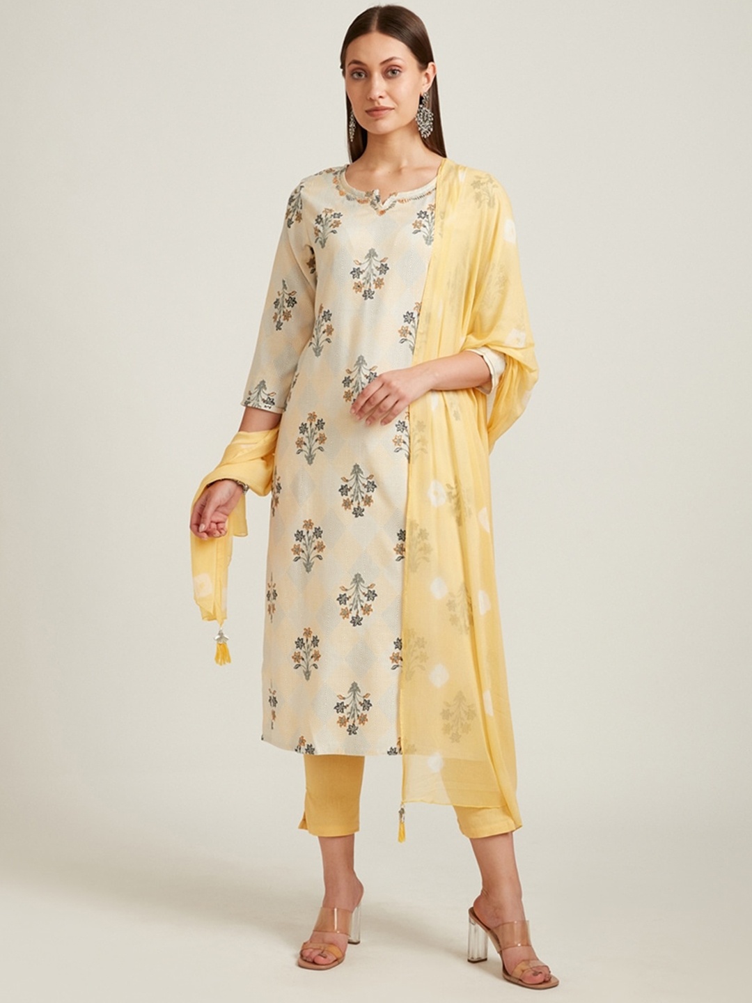 Neerus Women Yellow Floral Printed Panelled Mirror Work Kurta with Palazzos & With Dupatta
Neerus Women Yellow Floral Printed Panelled Mirror Work Kurta with Palazzos & With Dupatta