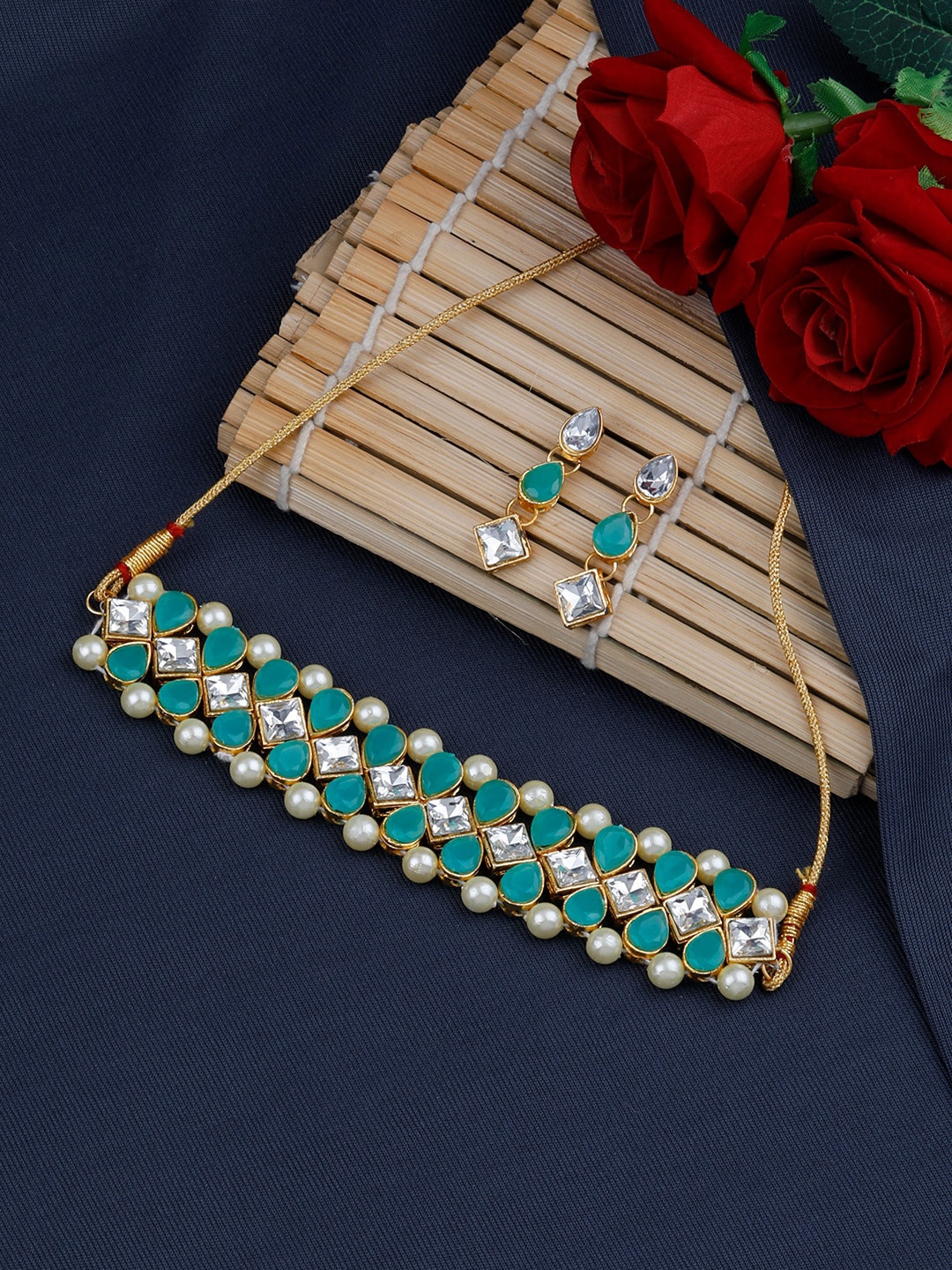 Silver Shine Gold-Toned Green & White Stone Studded & Beaded Traditional Designer Jewellery Set
Silver Shine Gold-Toned Green & White Stone Studded & Beaded Traditional Designer Jewellery Set