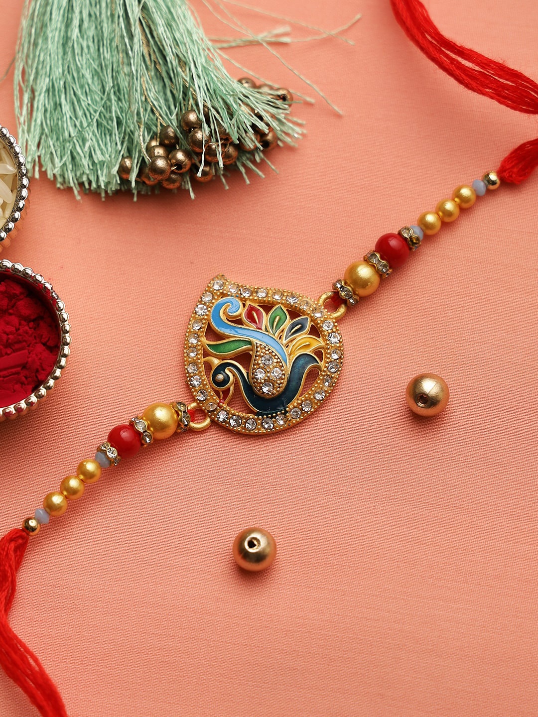 Aapno Rajasthan Unisex Beautiful Meenawork Peacock Rakhi With Golden Beads & Roli Chawal, Gold
Aapno Rajasthan Unisex Beautiful Meenawork Peacock Rakhi With Golden Beads & Roli Chawal, Gold