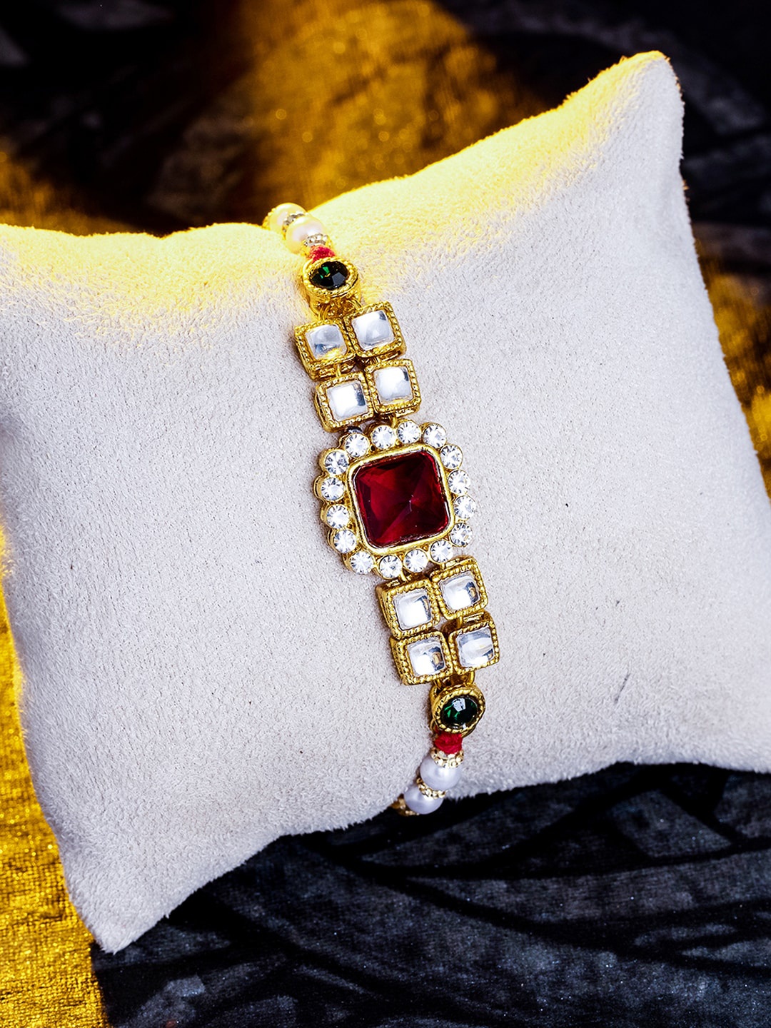 Sukkhi Rakhi Men Gold-Plated Red & White Stone Studded Rakhi with Roli Chawal & Greeting Card
Sukkhi Rakhi Men Gold-Plated Red & White Stone Studded Rakhi with Roli Chawal & Greeting Card