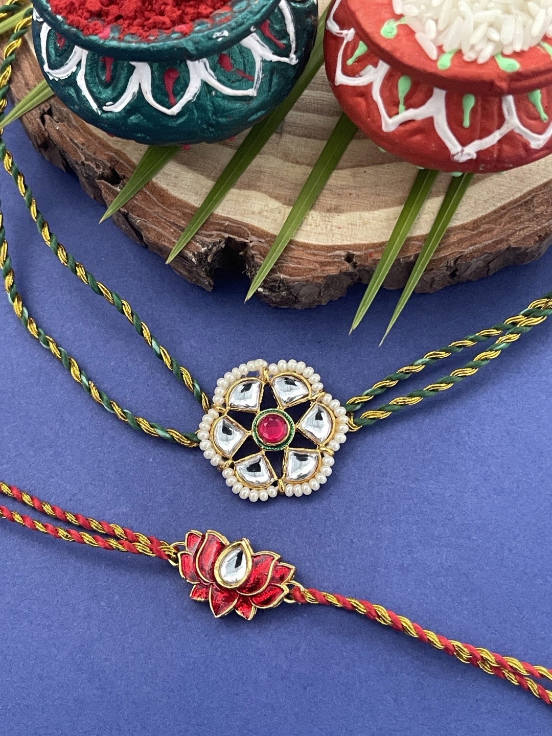Digital Dress Room Men Set Of 2 Gold-Toned White & Blue Stone-Studded & Pearl Beaded Rakhi
Digital Dress Room Men Set Of 2 Gold-Toned White & Blue Stone-Studded & Pearl Beaded Rakhi