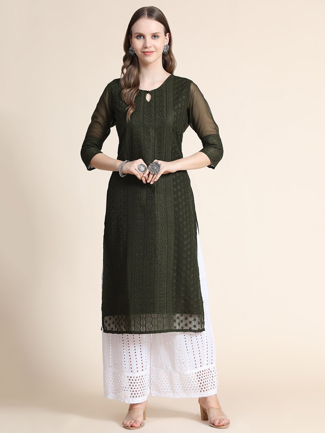 KALINI Women Olive Green Ethnic Motifs Embroidered Thread Work Floral Georgette Kurta
KALINI Women Olive Green Ethnic Motifs Embroidered Thread Work Floral Georgette Kurta