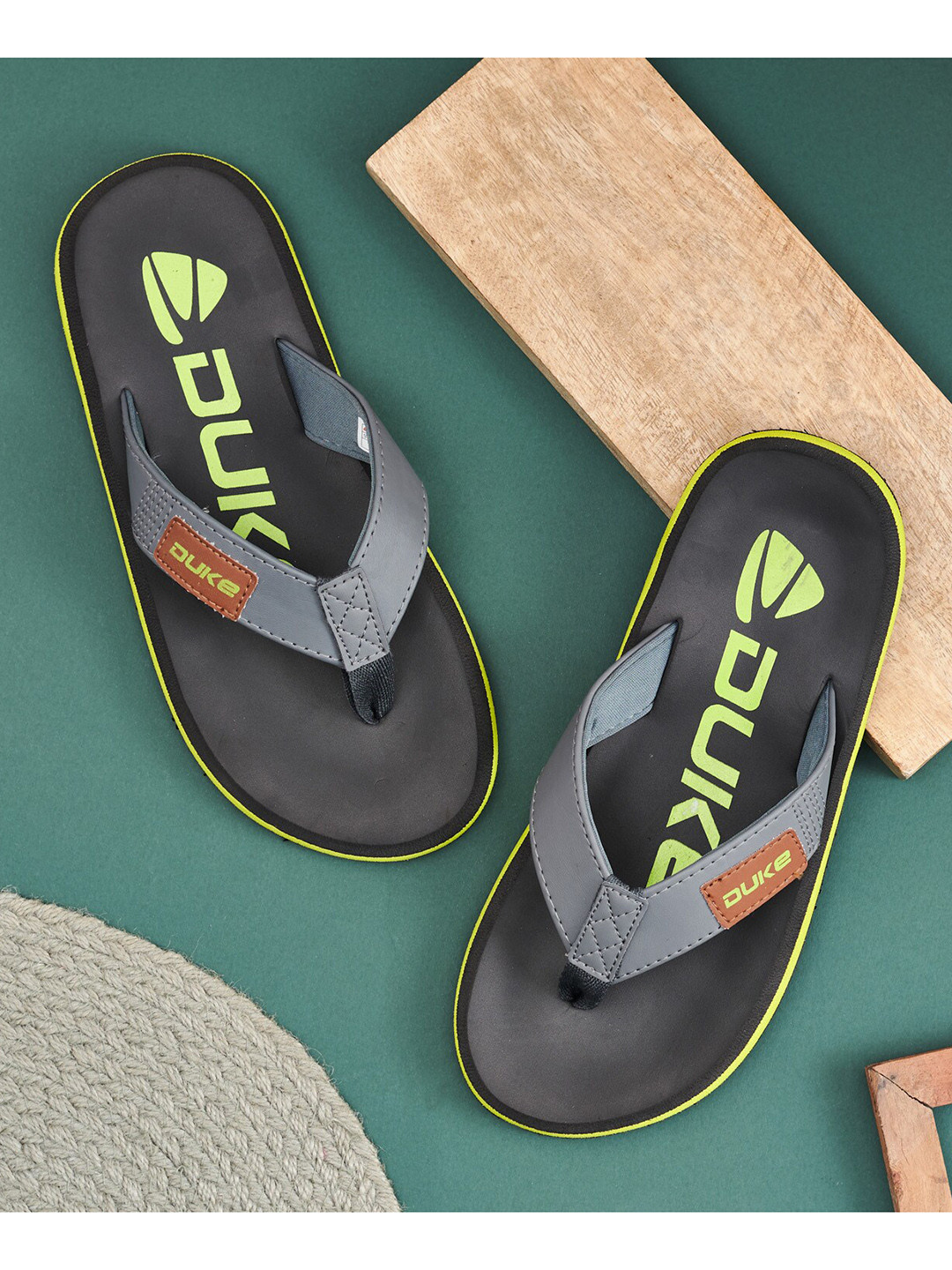 Duke Men Grey & Green Printed Thong Flip-Flops
Duke Men Grey & Green Printed Thong Flip-Flops