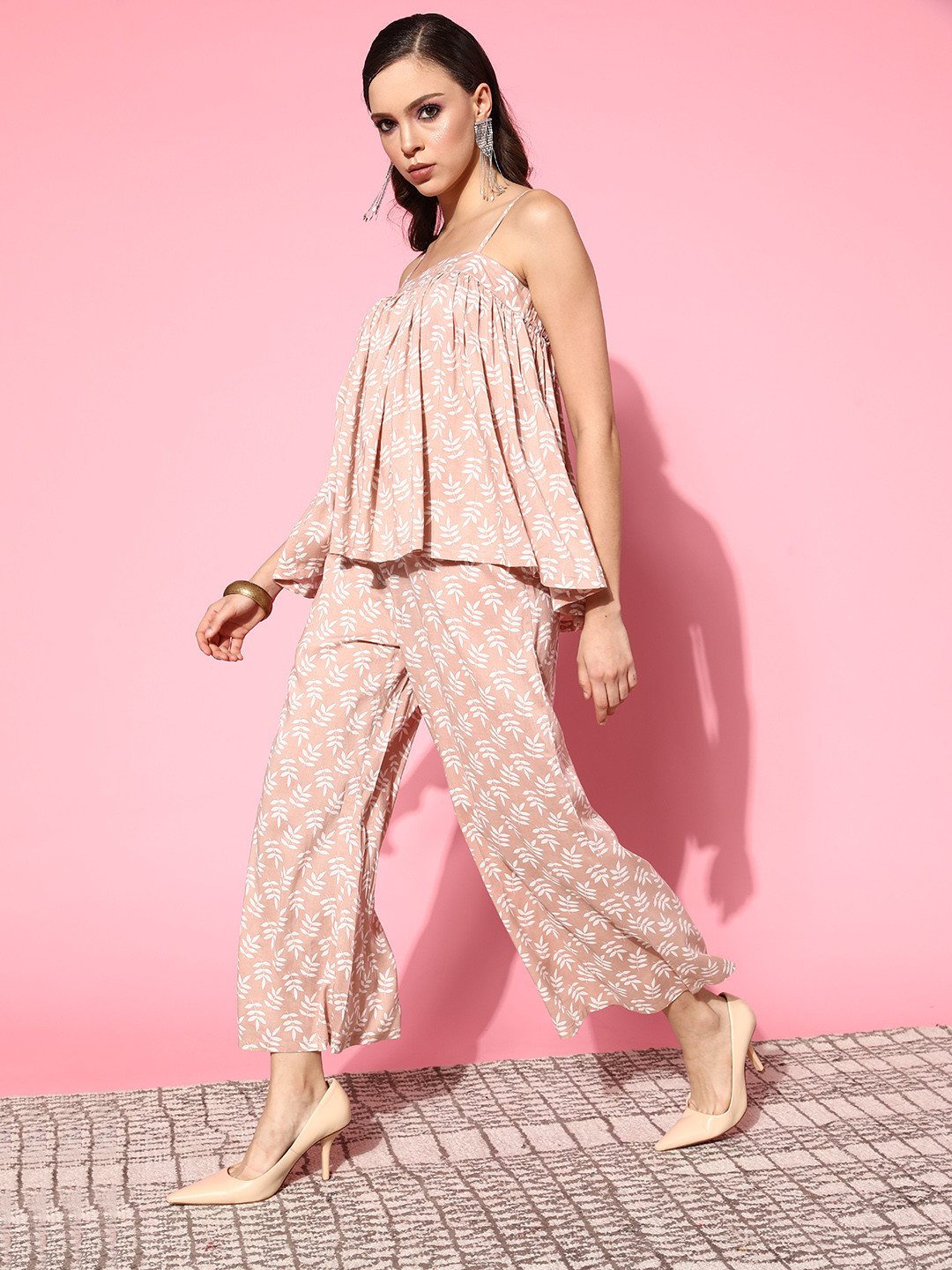 Shae by SASSAFRAS Women Attractive Peach Printed Top with Palazzos 
Shae by SASSAFRAS Women Attractive Peach Printed Top with Palazzos