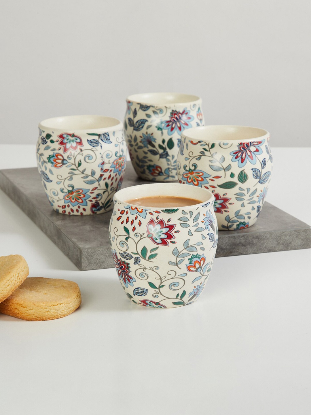 Home Centre Set of 4 White & Blue Printed Dishware safe Stoneware Glossy Cups 180ml each
Home Centre Set of 4 White & Blue Printed Dishware safe Stoneware Glossy Cups 180ml each