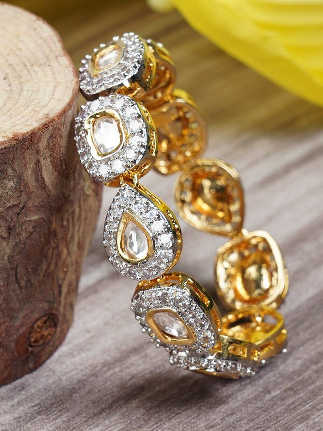 AURAA TRENDS Women Gold-Toned & White American Diamond Rhodium-Plated Bangle-Style Bracelet
AURAA TRENDS Women Gold-Toned & White American Diamond Rhodium-Plated Bangle-Style Bracelet