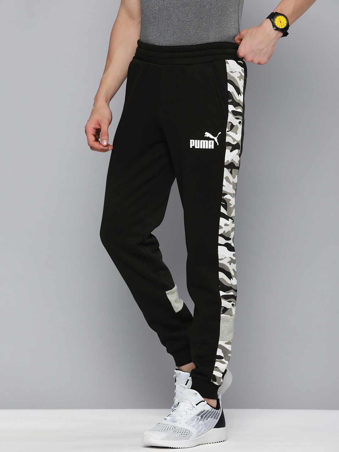 Puma Men Black & Grey Camouflage Side Striped Essential Side Striped Regular Fit Joggers
Puma Men Black & Grey Camouflage Side Striped Essential Side Striped Regular Fit Joggers