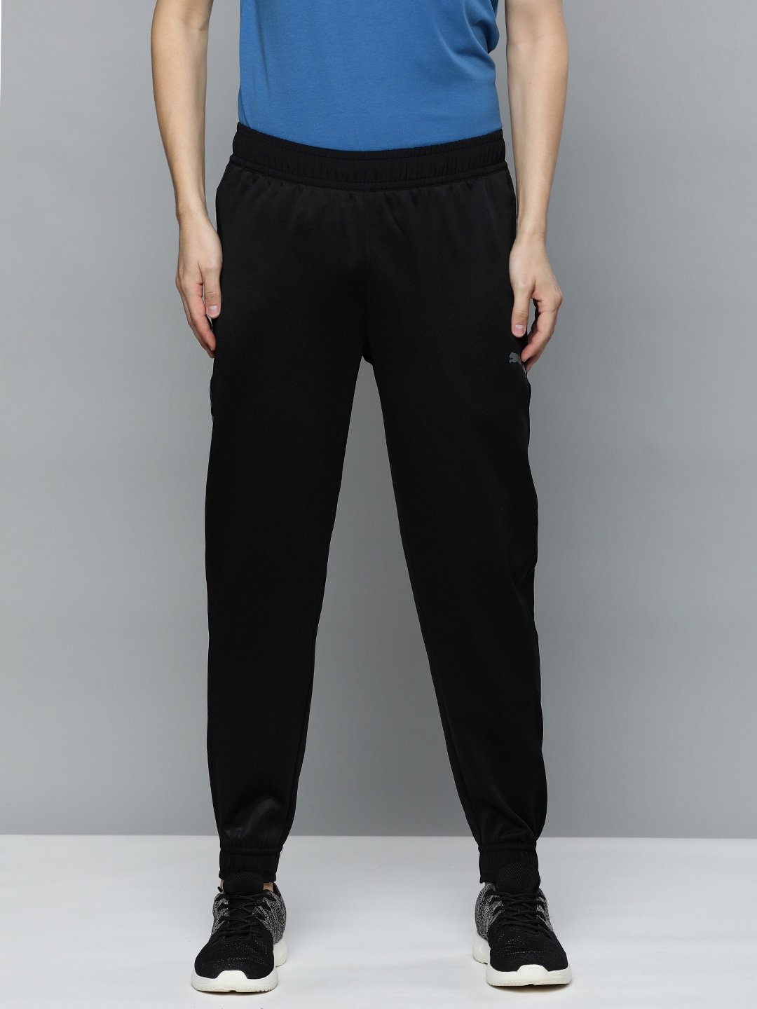 Puma Men Black Solid Regular Fit Mid-Rise Pwrfleece Training Joggers with Side Taping
Puma Men Black Solid Regular Fit Mid-Rise Pwrfleece Training Joggers with Side Taping