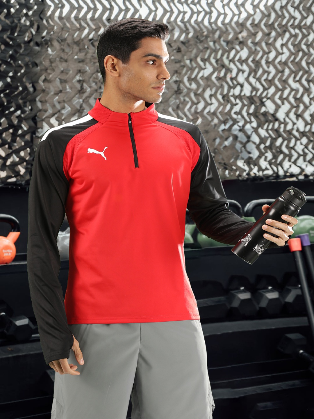 Puma Men Red & Black Mandarin Collar Solid Football T-shirt with Contrast Raglan Sleeves
Puma Men Red & Black Mandarin Collar Solid Football T-shirt with Contrast Raglan Sleeves