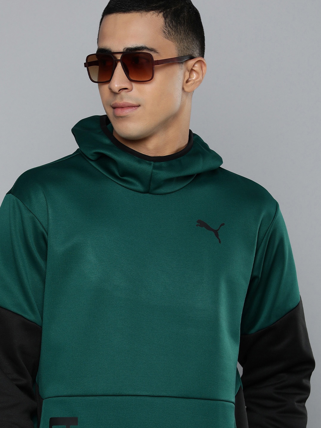 Puma Men Teal Green And Black Colourblocked TRAIN ALL DAY PWRFLEECE Hooded Sweatshirt
Puma Men Teal Green And Black Colourblocked TRAIN ALL DAY PWRFLEECE Hooded Sweatshirt