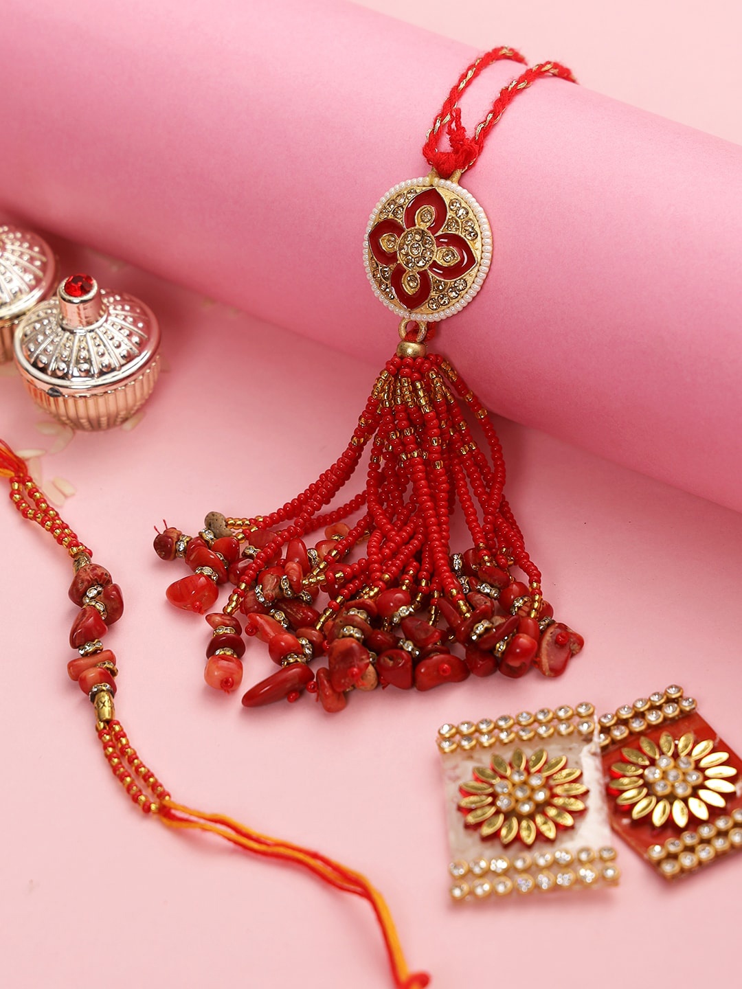 Aapno Rajasthan Set Of 2 Gold-Toned & Red AD -Studded & Beaded Rakhi With Roli Rice & Greeting Card
Aapno Rajasthan Set Of 2 Gold-Toned & Red AD -Studded & Beaded Rakhi With Roli Rice & Greeting Card
