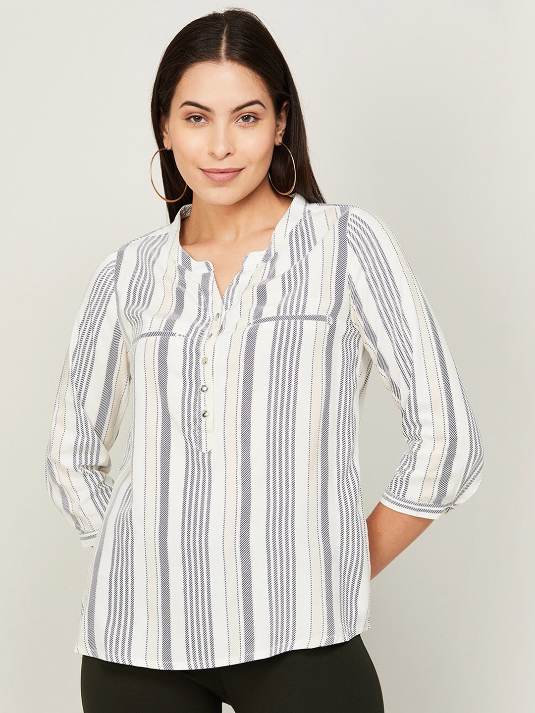 Fame Forever by Lifestyle Women Navy Blue & White Striped Mandarin Collar Shirt Style Top
Fame Forever by Lifestyle Women Navy Blue & White Striped Mandarin Collar Shirt Style Top