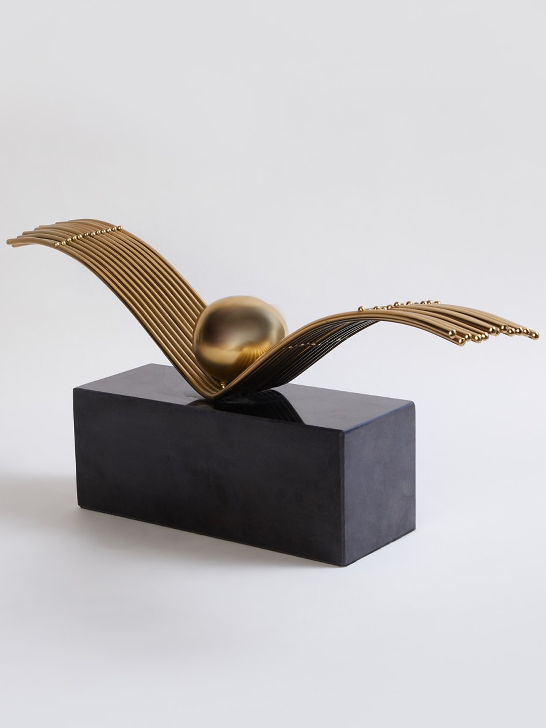 Home Centre Gold-Toned & Black Textured Bird Shape Table Decor with Marble Base