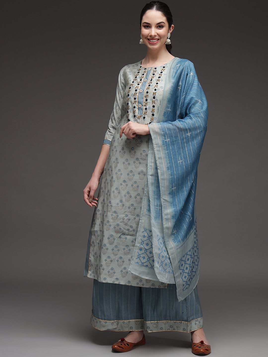 Nehamta Women Grey Floral Printed Beads and Stones Kurti with Palazzos & With Dupatta
Nehamta Women Grey Floral Printed Beads and Stones Kurti with Palazzos & With Dupatta