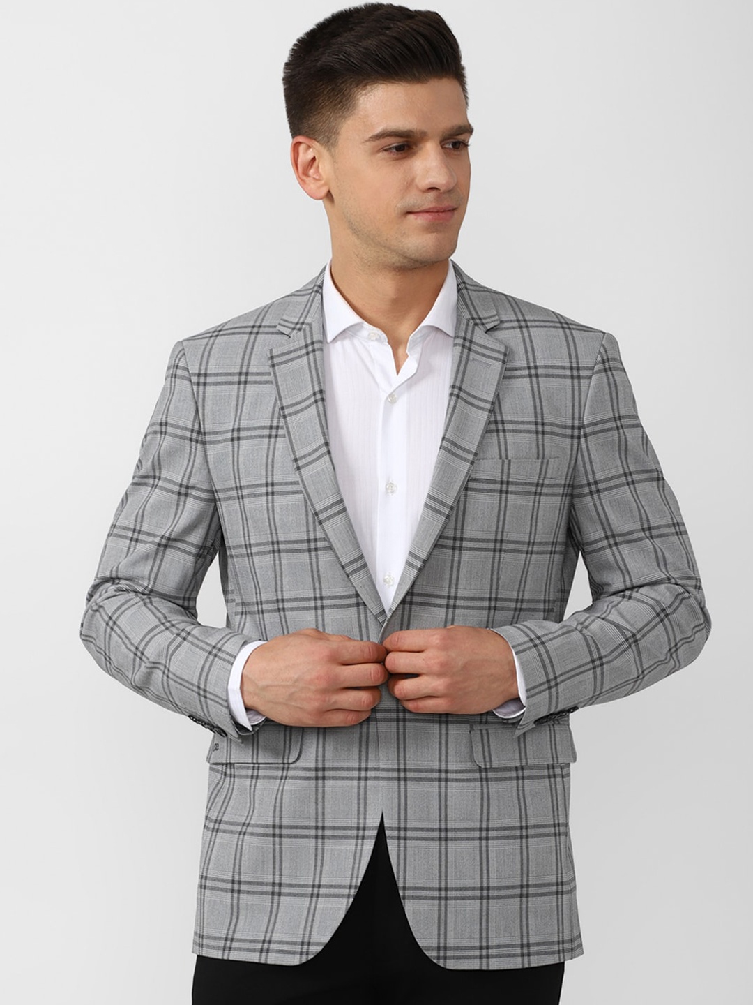 Peter England Elite Men Grey & Black Checked Single-Breasted Slim-Fit Casual Blazer
Peter England Elite Men Grey & Black Checked Single-Breasted Slim-Fit Casual Blazer