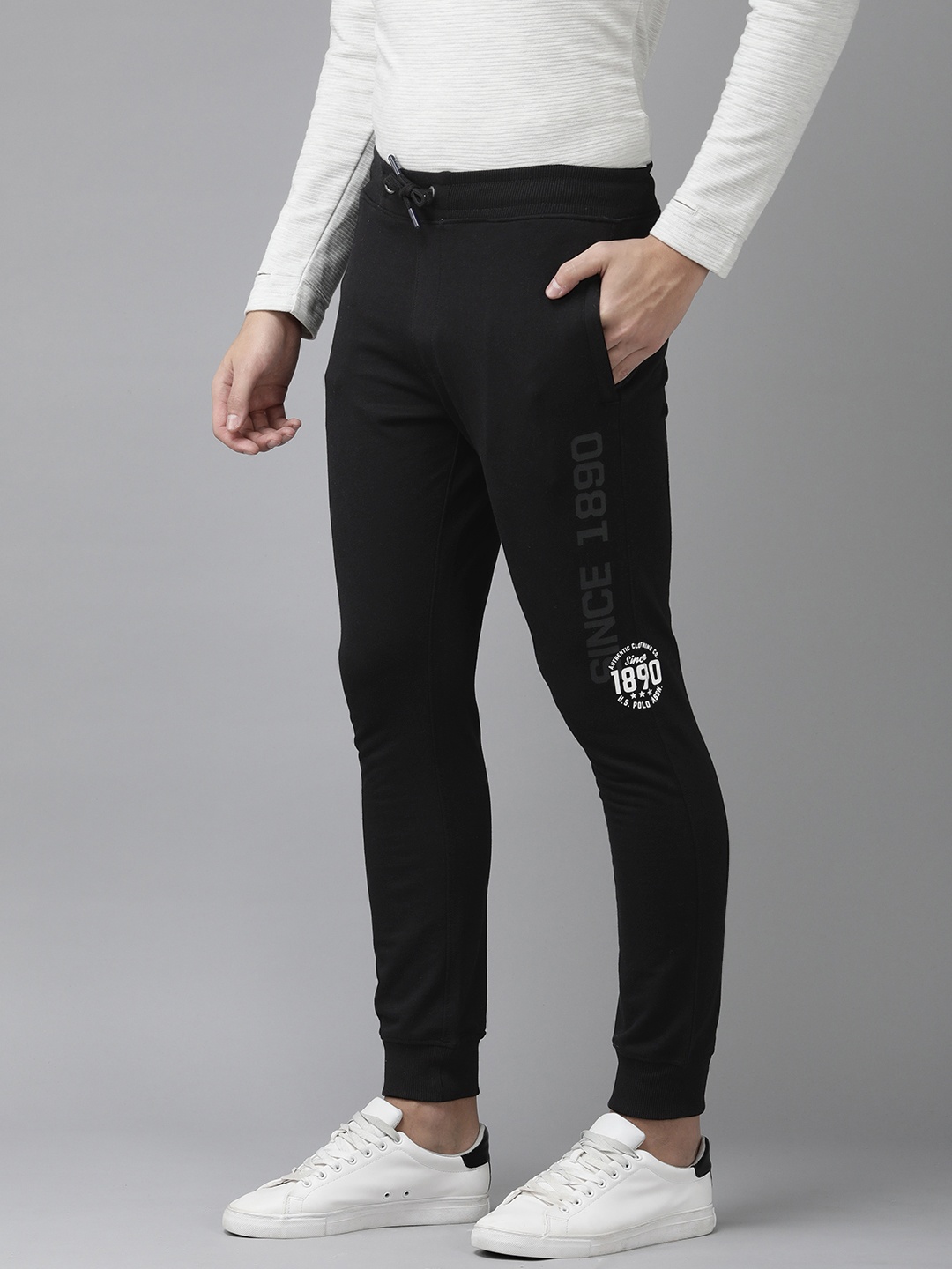 U.S. Polo Assn. Denim Co. Men Black Solid Mid-Rise Knitted Joggers With Brand Logo Print
U.S. Polo Assn. Denim Co. Men Black Solid Mid-Rise Knitted Joggers With Brand Logo Print