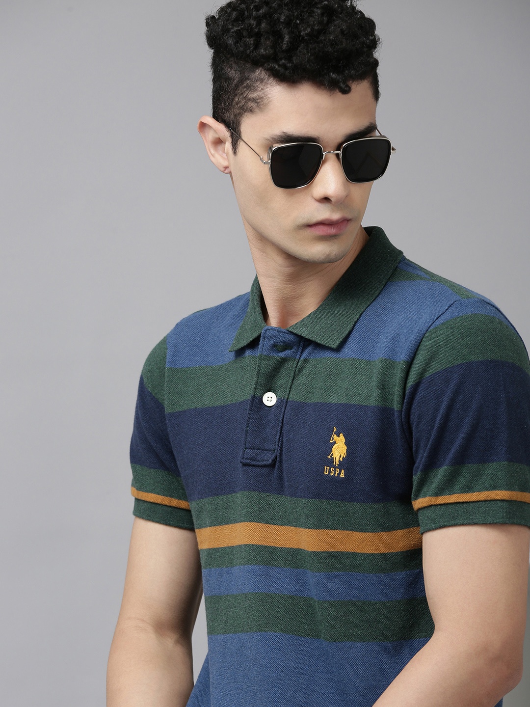 U.S. Polo Assn. Men Green & Blue Striped Polo Collar Pure Cotton Slim Fit T-shirt
U.S. Polo Assn. Men Green & Blue Striped Polo Collar Pure Cotton Slim Fit T-shirt
