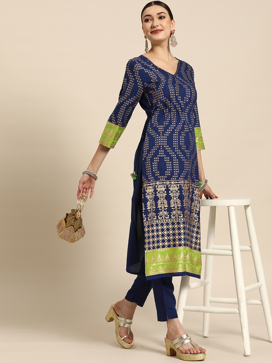 Sangria Women Navy Blue Ethnic Printed Mirror Work Tassel Detail Kurta with Trousers
Sangria Women Navy Blue Ethnic Printed Mirror Work Tassel Detail Kurta with Trousers