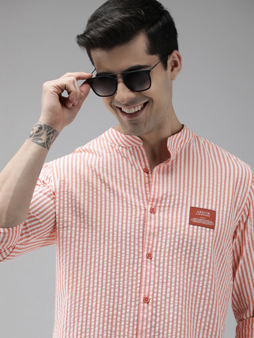 THE BEAR HOUSE Ardor Edition Men Peach-Coloured Slim Fit Pinstripes Cotton Casual Shirt
THE BEAR HOUSE Ardor Edition Men Peach-Coloured Slim Fit Pinstripes Cotton Casual Shirt