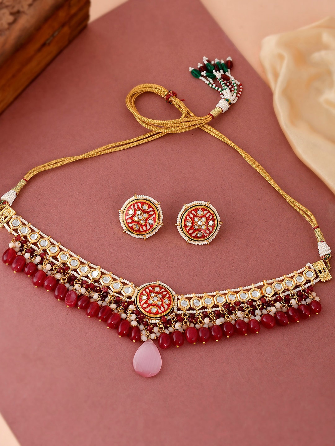 DASTOOR 24 K Gold-Plated White & Red Kundan-Studded & Pearl Beaded Jewellery Set
DASTOOR 24 K Gold-Plated White & Red Kundan-Studded & Pearl Beaded Jewellery Set