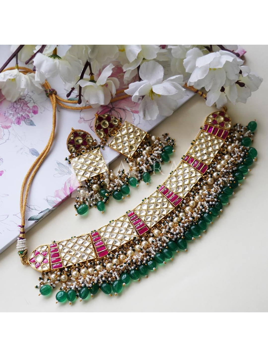 AURAA TRENDS 22 KT Gold-Plated White & Green Kundan-Studded & Pearl Beaded Jewellery Set
AURAA TRENDS 22 KT Gold-Plated White & Green Kundan-Studded & Pearl Beaded Jewellery Set