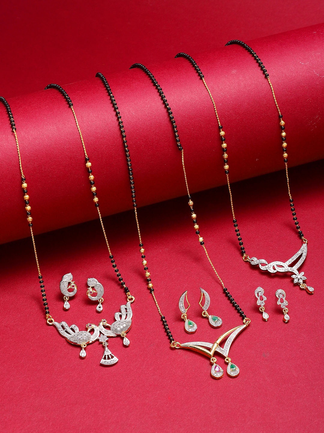 ZENEME Set Of 3 Gold-Plated Black Beaded White AD Studded Mangalsutra With Earring Set
ZENEME Set Of 3 Gold-Plated Black Beaded White AD Studded Mangalsutra With Earring Set