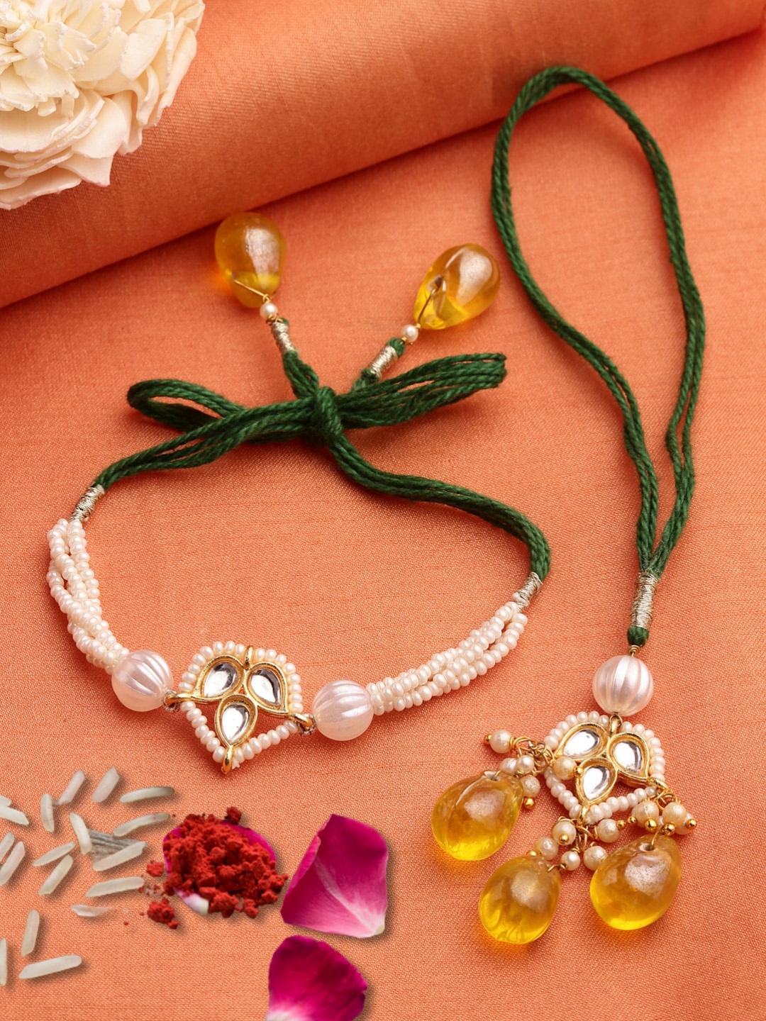 DUGRISTYLE Pack Of 2 Green & Yellow Kundan Studded Bhaiya Bhabi Rakhi With Roli Chawal
DUGRISTYLE Pack Of 2 Green & Yellow Kundan Studded Bhaiya Bhabi Rakhi With Roli Chawal