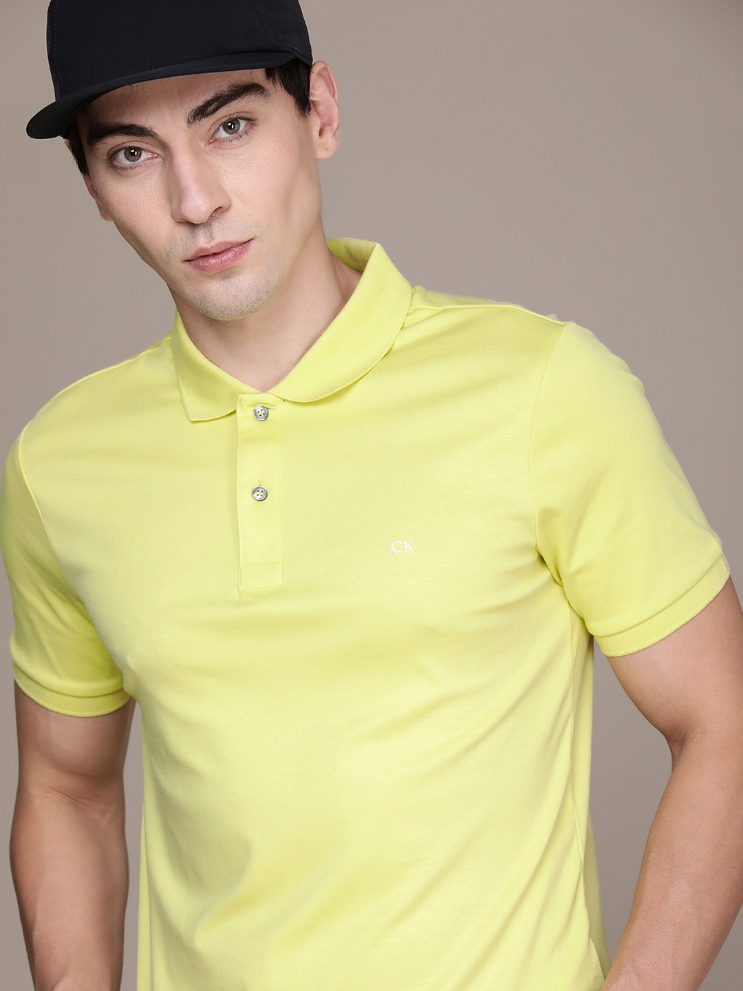 Calvin Klein Jeans Men Yellow Polo Collar Pure Cotton Applique Slim Fit T-shirt
Calvin Klein Jeans Men Yellow Polo Collar Pure Cotton Applique Slim Fit T-shirt
