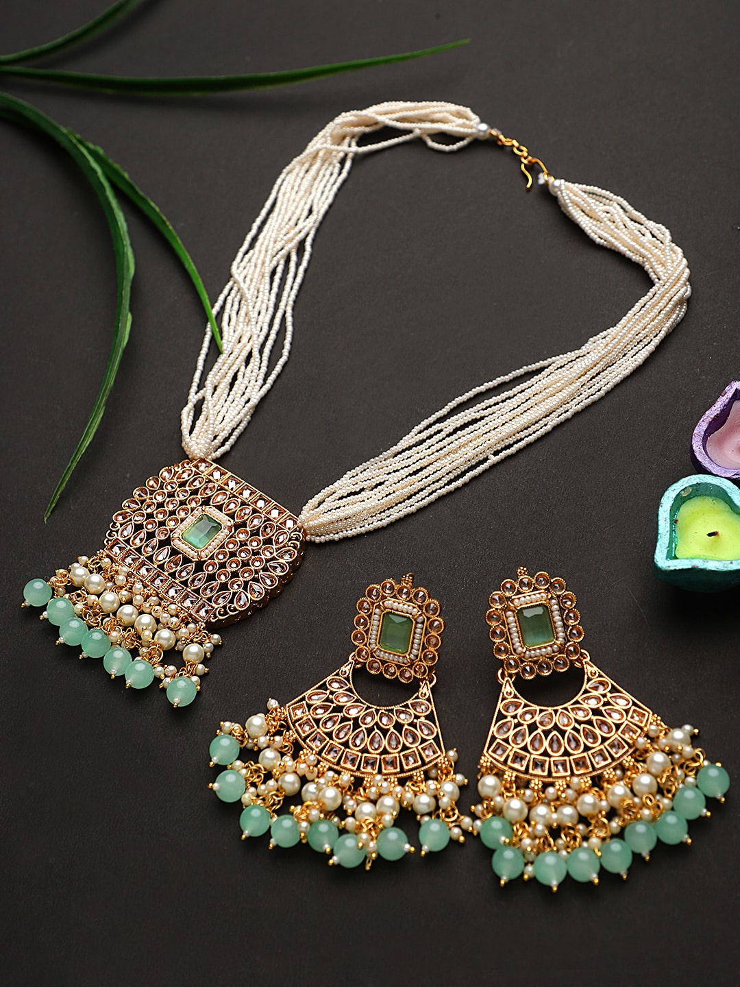 STEORRA JEWELS Gold-Plated Green Kundan Stone & White Beads Long Necklace Jewellery Set
STEORRA JEWELS Gold-Plated Green Kundan Stone & White Beads Long Necklace Jewellery Set