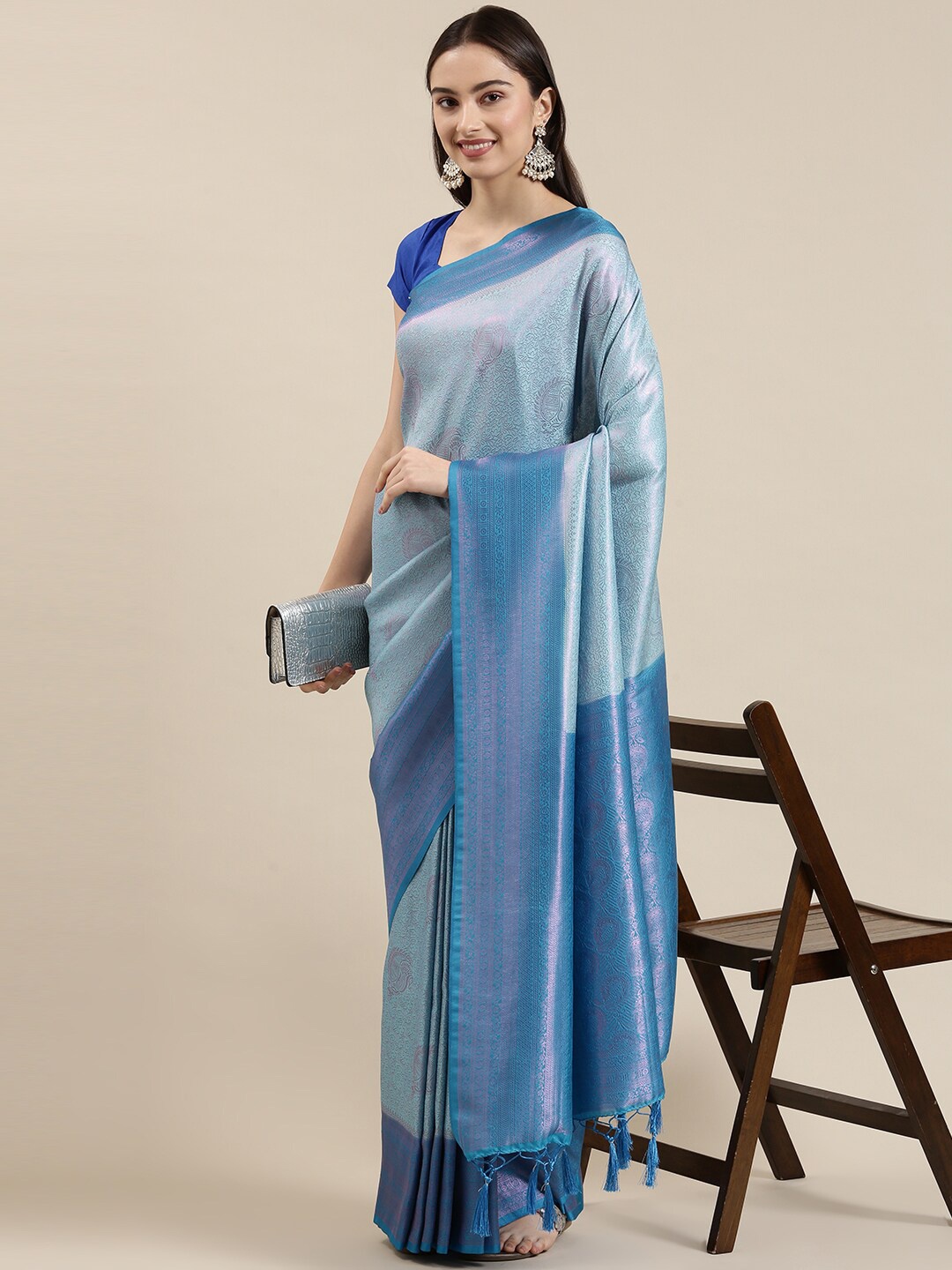 The Chennai Silks Blue & Silver-Toned Woven Design Zari Art Silk Fusion Banarasi Saree
The Chennai Silks Blue & Silver-Toned Woven Design Zari Art Silk Fusion Banarasi Saree