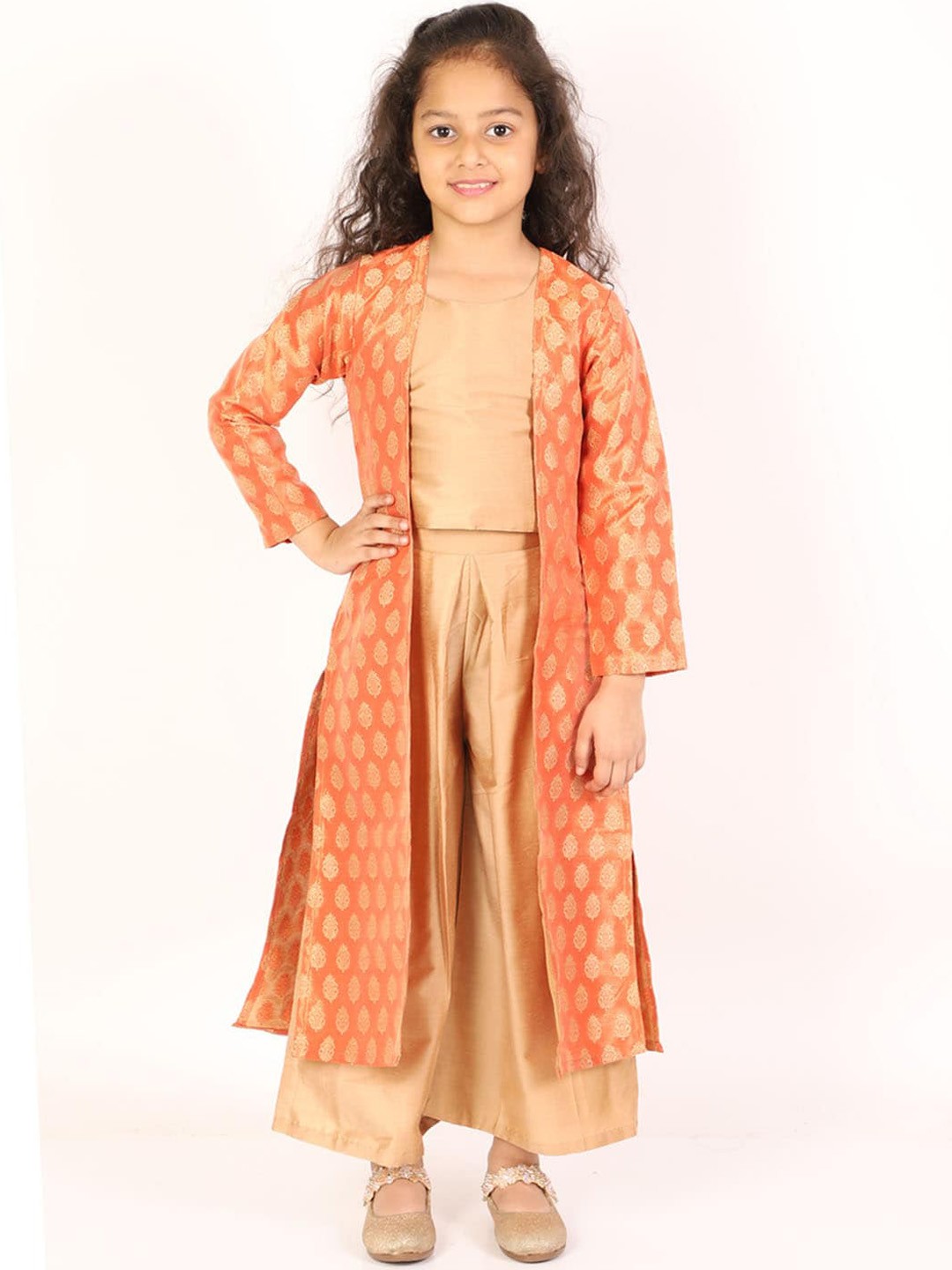 JBN Creation Girls Orange and Gold Brocade Cotton Silk Crop Top Pallazo And Shrug Set
JBN Creation Girls Orange and Gold Brocade Cotton Silk Crop Top Pallazo And Shrug Set
