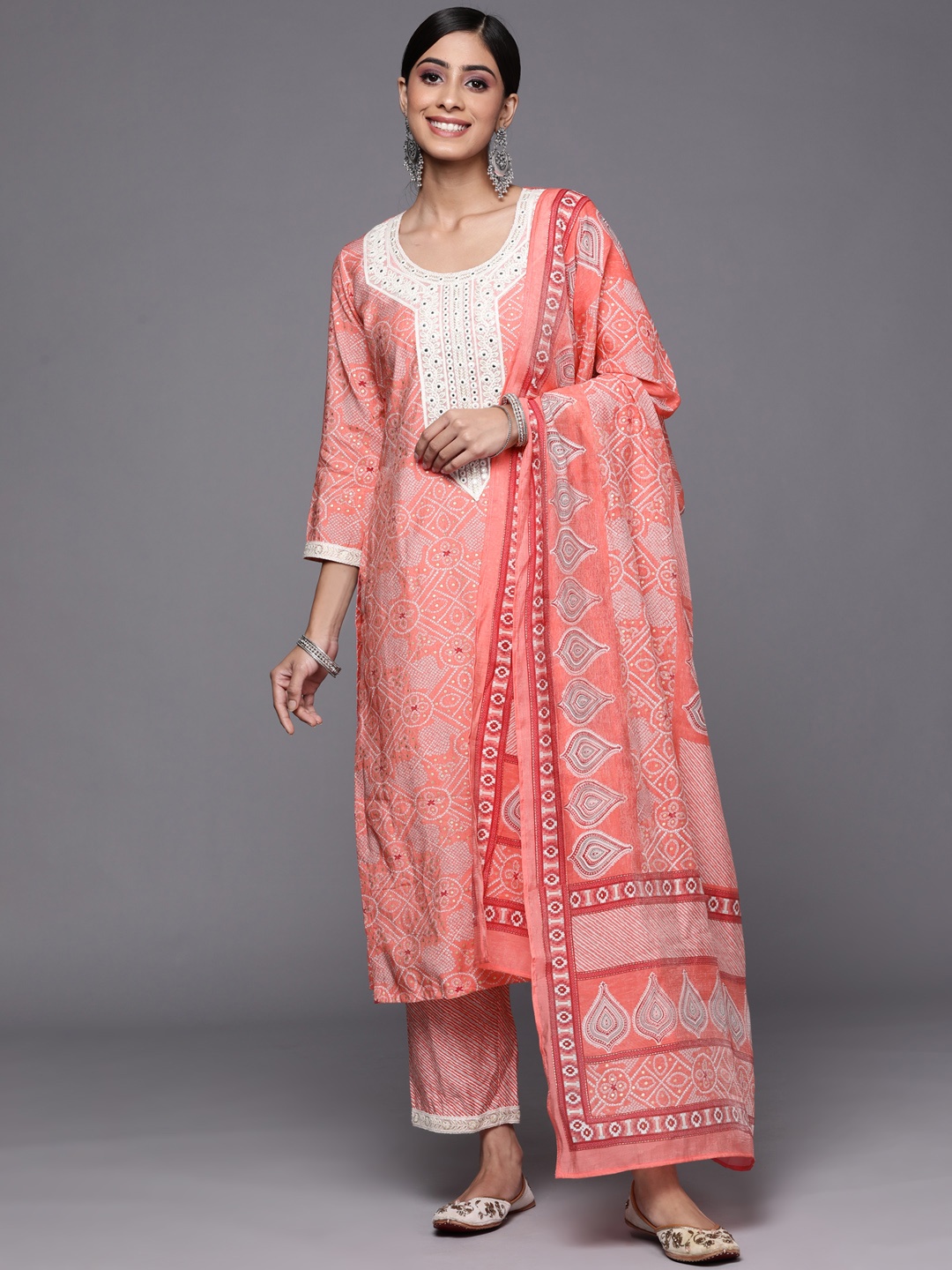 Libas Women Pink Bandhani Printed Mirror Work Lace Detail Kurta with Trousers & Dupatta
Libas Women Pink Bandhani Printed Mirror Work Lace Detail Kurta with Trousers & Dupatta