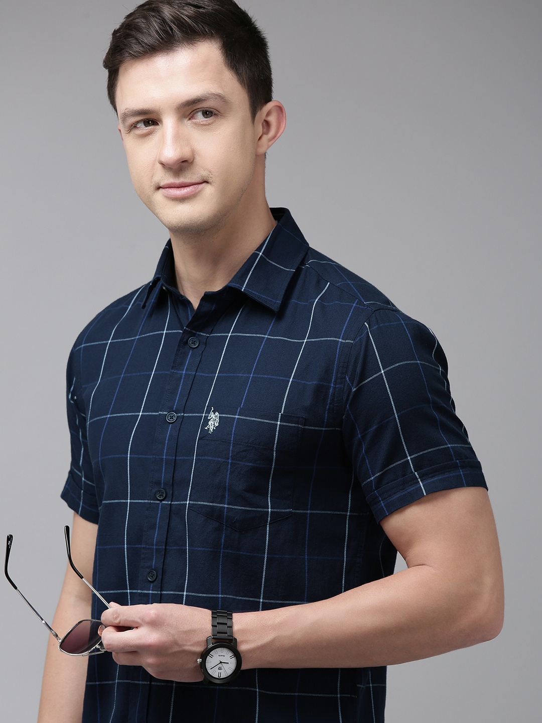 U S Polo Assn Men Navy Blue & White Tailored Fit Checked Pure Cotton Casual Shirt
U S Polo Assn Men Navy Blue & White Tailored Fit Checked Pure Cotton Casual Shirt