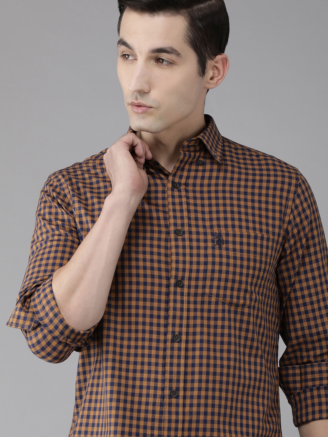 U S Polo Assn Men Brown & Navy Blue Tailored Fit Gingham Checks Pure Cotton Casual Shirt
U S Polo Assn Men Brown & Navy Blue Tailored Fit Gingham Checks Pure Cotton Casual Shirt