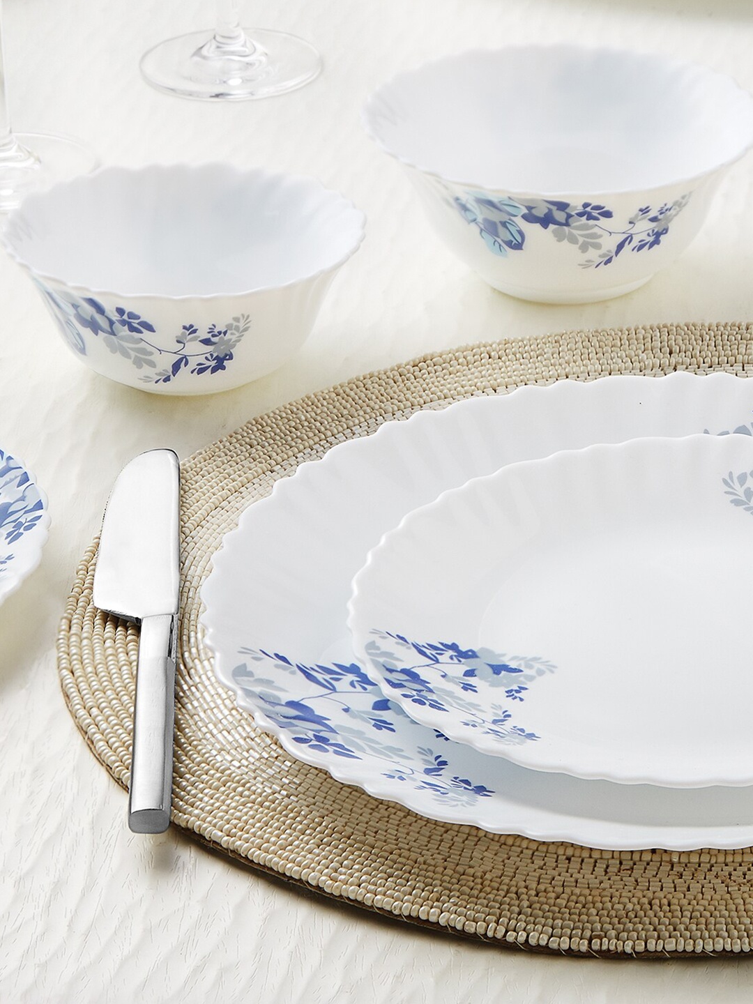 Larah by BOROSIL White & Blue Set Of 19 Pieces Floral Printed Opalware Glossy Dinner Set
Larah by BOROSIL White & Blue Set Of 19 Pieces Floral Printed Opalware Glossy Dinner Set