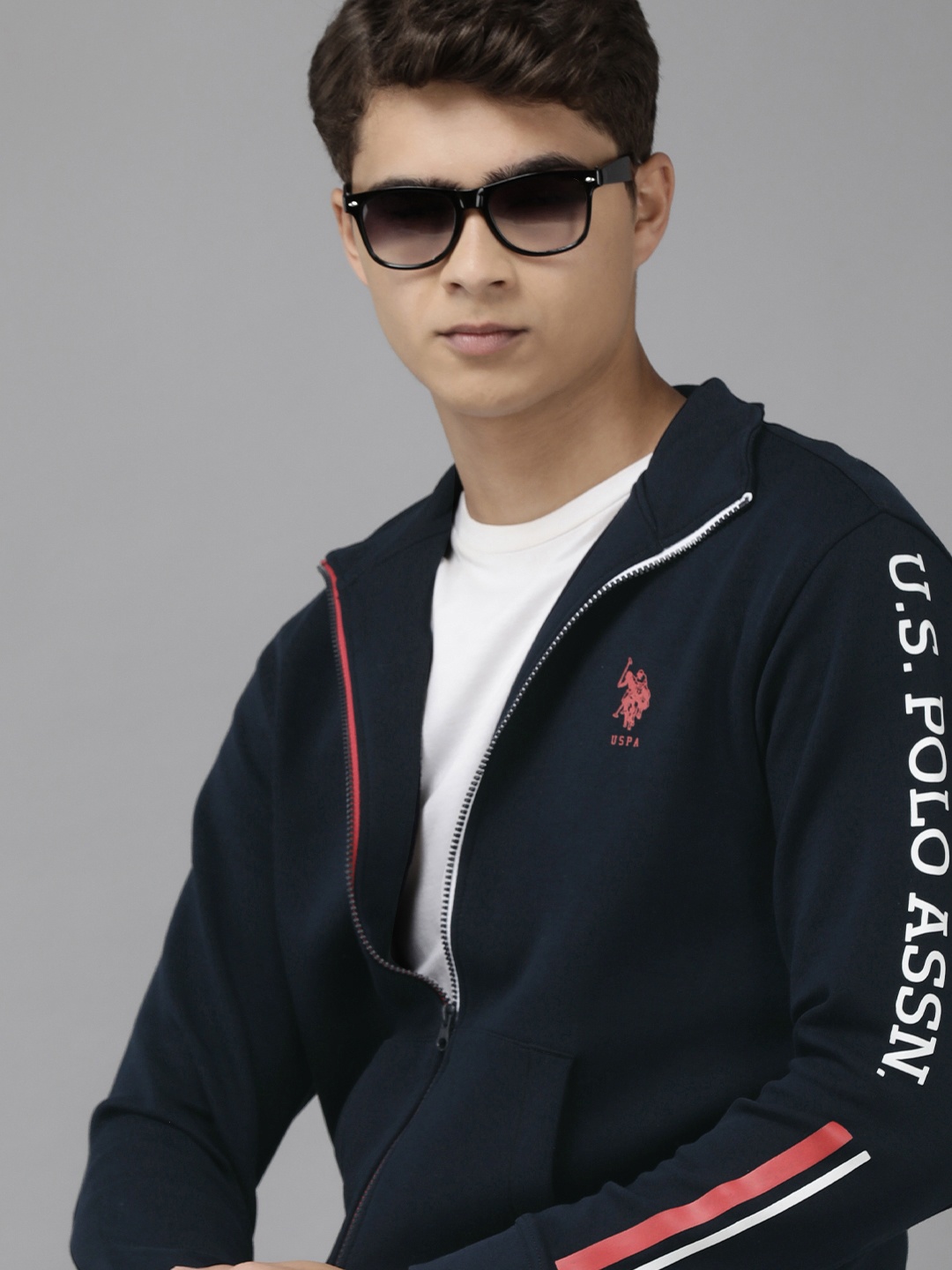 U S Polo Assn Men Navy Blue Open-Front Solid Sweatshirt with Typography Sleeves
U S Polo Assn Men Navy Blue Open-Front Solid Sweatshirt with Typography Sleeves